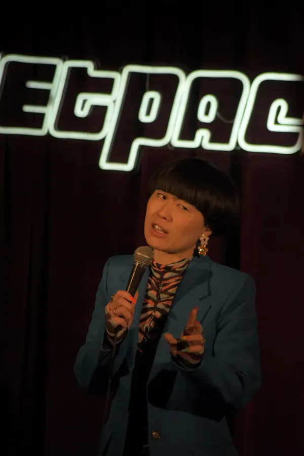 A comedian on the Jetpack stage