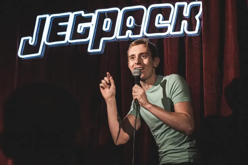 A comedian on the Jetpack stage
