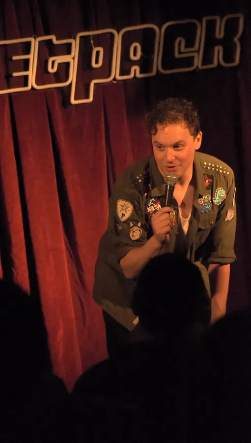 A comedian on the Jetpack stage