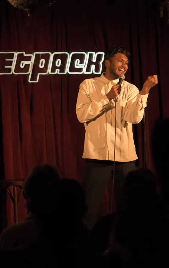 A comedian on the Jetpack stage